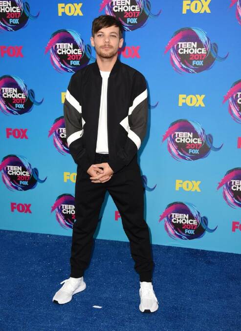 Louis Tomlinson arrives at the Teen Choice Awards at the Galen Center on Sunday, Aug. 13, 2017, in Los Angeles. (Photo by Jordan Strauss/Invision/AP)