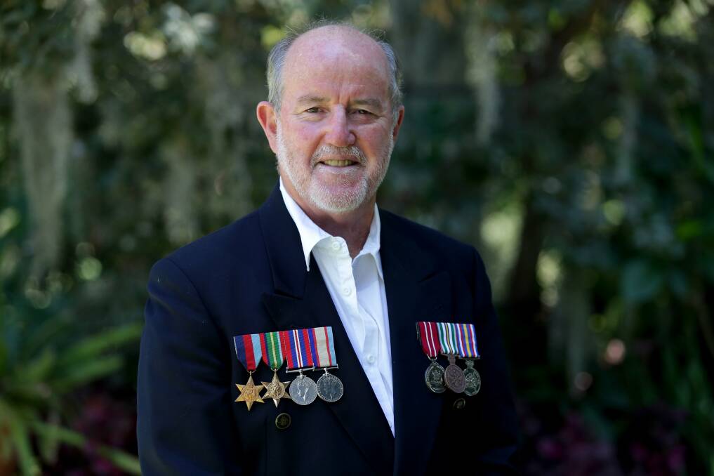 More work to do: Bruce Hancock from St George and Sutherland Legacy wears his father's war service medals and his own National Service medals. Picture: Jane Dyson