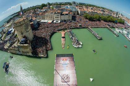 Artem Silchenko of Russia diving from the 27.5 metre platform on the Saint Nicolas Tower during the second stop of the Red Bull Cliff Diving World Series at La Rochelle, France. Gary Hunt of the UK won the event, with fellow Briton Blake Aldridge placing second and Orlando Duque of Colombia third. Photo: vincent curutchet
