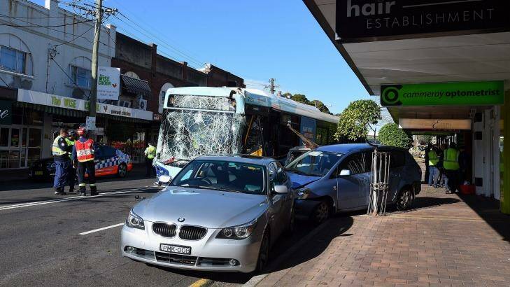 The impact of the crash pushed one of the cars onto the footpath in Cammeray. Photo: Kate Geraghty