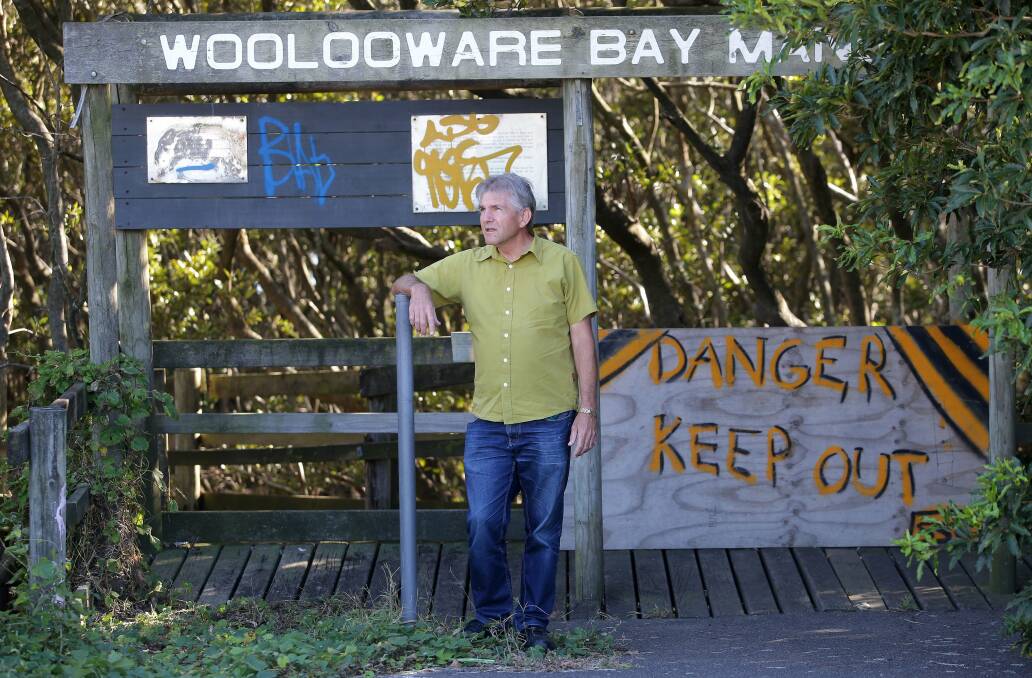 Outrageous: Resident Jeff Harte says the boardwalk is a disgrace. Picture: John Veage