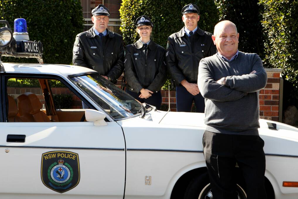 End of an era: Gary Koschel, of Mortdale, retired on his 60th birthday after more than four decades in the police force. His farewell included a visit from the first patrol car he drove. Picture: Jane Dyson
