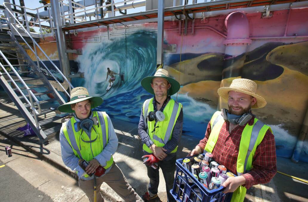 Facelift:   The Cronulla Waste Water Treatment Plant gets some colour. Jan Birkner, Scott Nagy and Giles Fryer with their work.  Picture: John Veage
