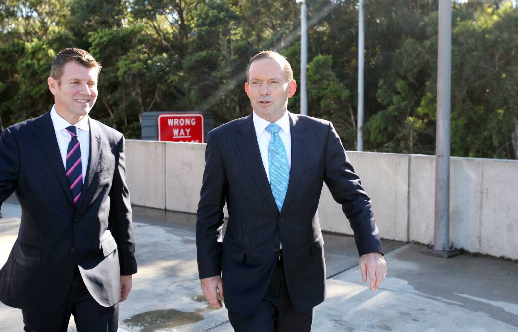 Tony Abbott and Mike Baird meet to sign a funding agreement to accelerate the WestConnex motorway following the federal budget. Picture Chris Lane