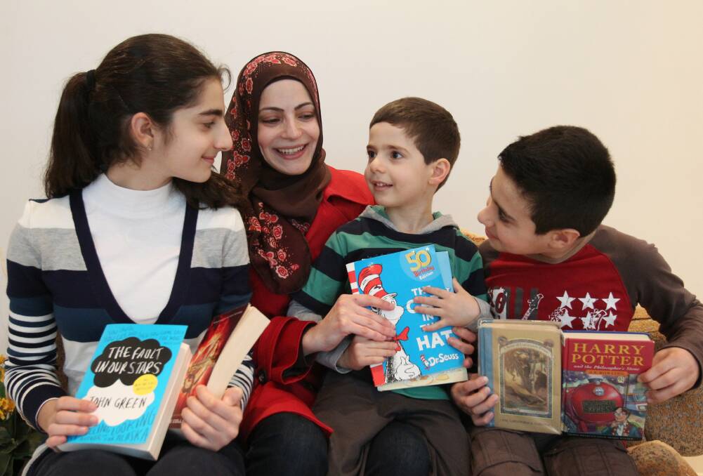 Bright sparks: Lina, 12, (left) Amir, 4, and Ryan, 10, Zaioor love to learn. Their mother Manal Ayoub is proud of them. Picture: Chris Lane