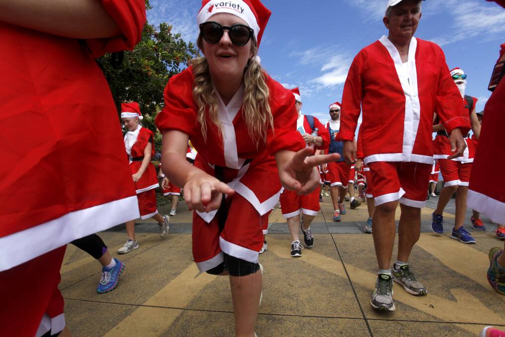 Doing it for the kids: The Santa Fun Run aims to raise $250,000 in 2015. Picture: Brock Perks