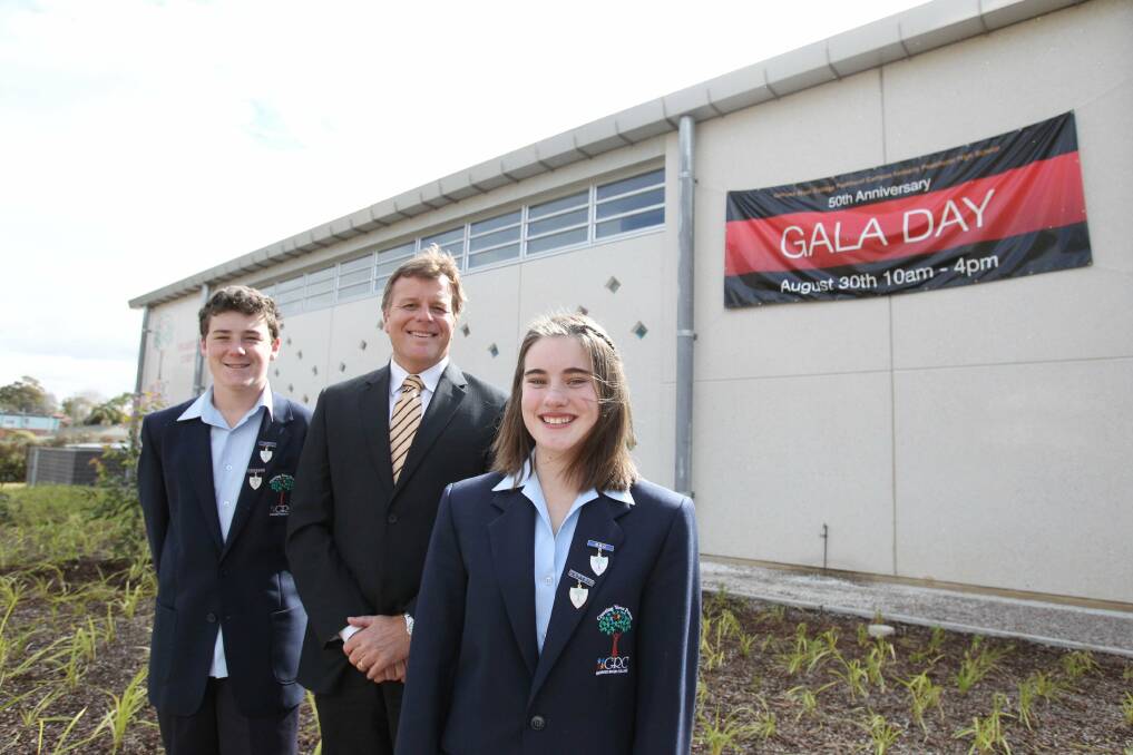 History time: This year marks a decade in the making for Georges River College Peakhurst campus. Acting principal Neale Harries and students including Lachlan Beccaris and Olivia McClatchey will celebrate the milestone with the opening of new school buildings. Picture: Chris Lane