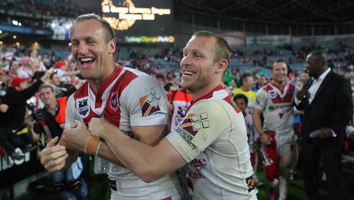 Sage advice: Mark Gasnier (left) with Ben Hornby celebrate after the 2010 Grand Final win.