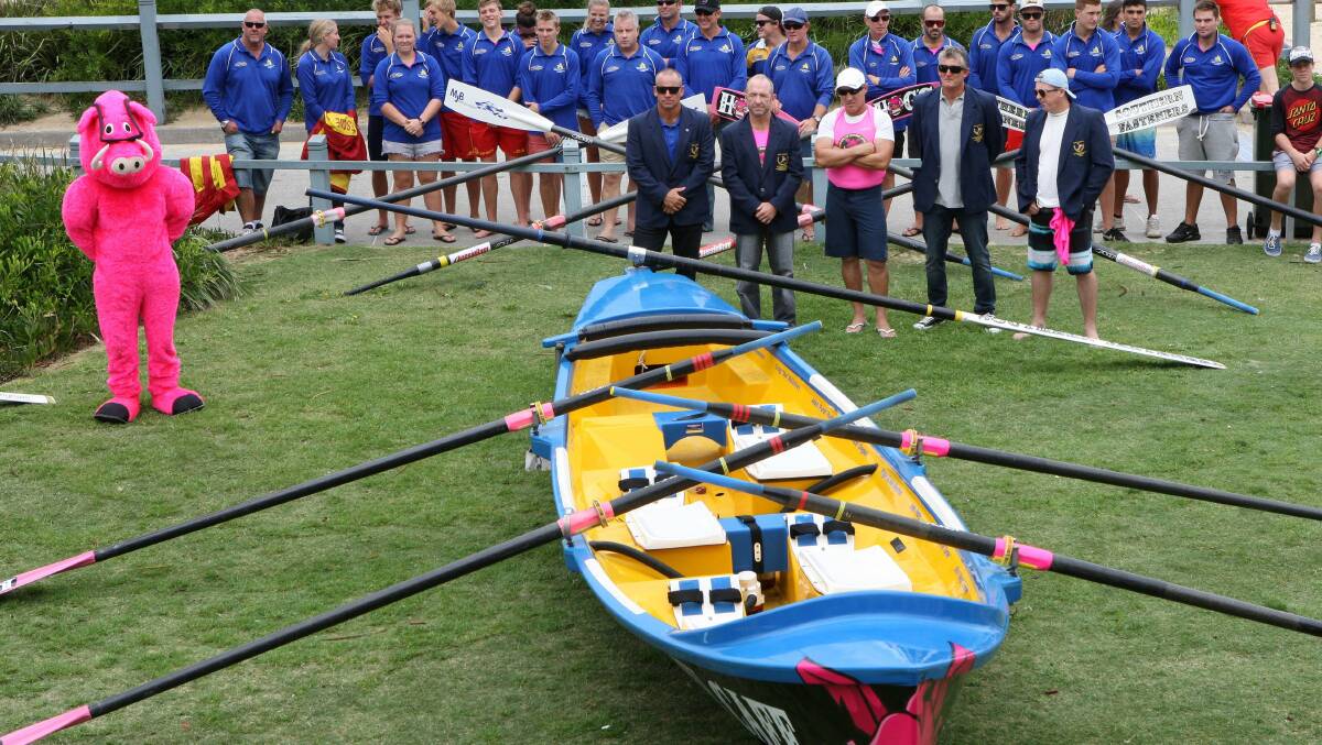 Launch: While other competitors prepared for this week's state surf lifesaving titles, North Cronulla SLSC launched two new surfboats, sponsored by Hogs Breath Cafe at Cronulla, outside their clubhosue on Sunday. Picture: John Veage