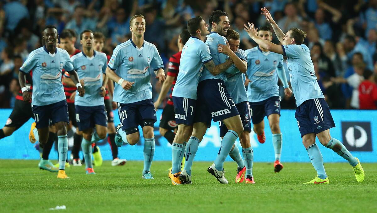 Sydney FC celebrates after scoring a goal during the round two A-League match between Sydney FC and the Western Sydney Wanderers at Allianz Stadium on October 18. Picture: Mark Kolbe, Getty Images
