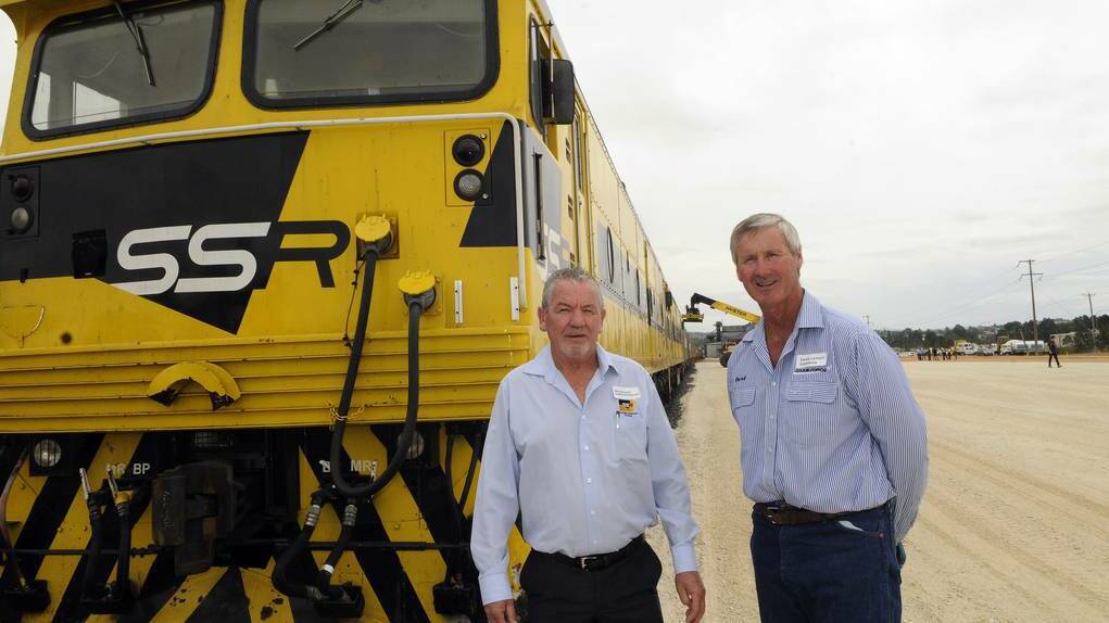 WESTERN ADVOCATE (Bathurst) - Southern Shorthaul Rail director and proud former Bathurst boy Milton Bromwich (left) with Derek Larnach from the Kelso-based Grainforce Commodities at last week's official opening of the new local rail terminal.