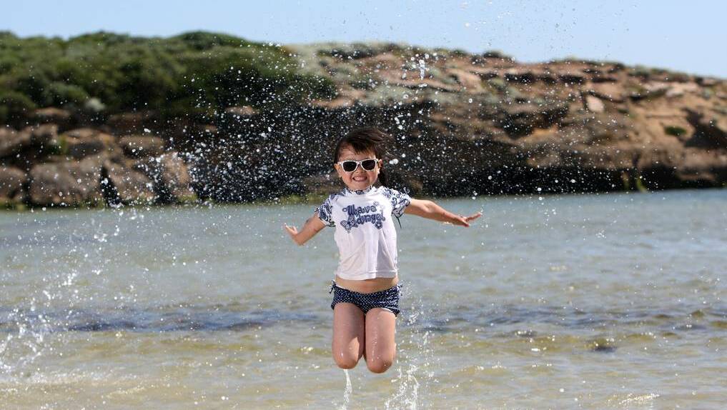 THE STANDARD (Warrnambool) - Bianca Xu, 5, from Melbourne splashes in the water at Stingray Bay. Picture: VICKY HUGHSON
