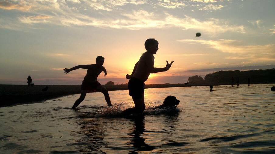 THE STANDARD (Warrnambool) - Children play at the Hopkins River mouth. Picture: DAMIAN WHITE