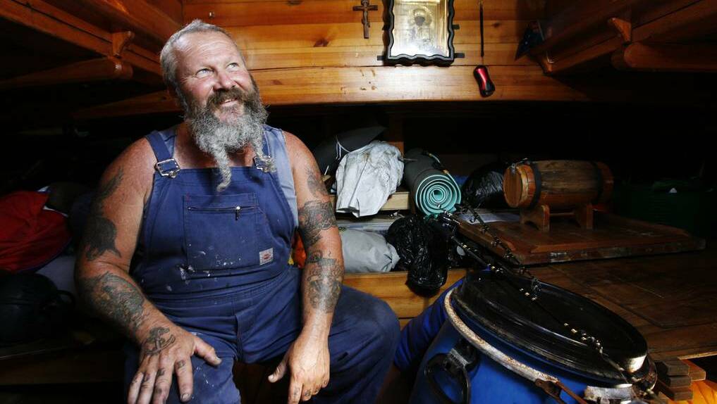 NEWCASTLE HERALD - Kevin Henry on board the Viking replica vessel "Rusich" built in Russia and sailed to Australia - the ship will be kept on Lake Macquarie until its new owner arrives. Picture: Ryan Osland