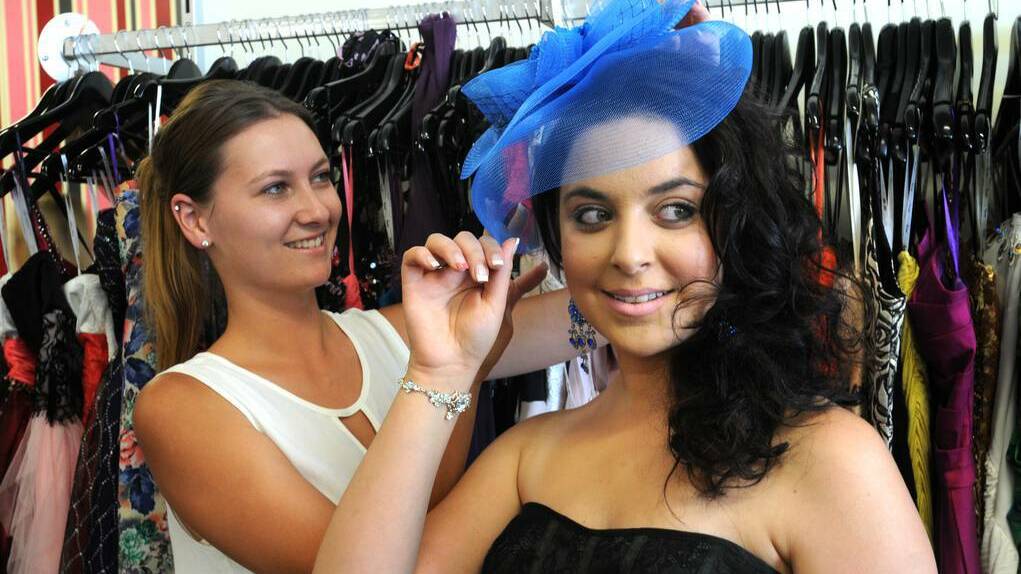 CENTRAL WESTERN DAILY (Orange) - Photo stylist Melise Coleman helps Dianne Taouk get ready for the Orange Picnic Races. Photo: STEVE GOSCH
