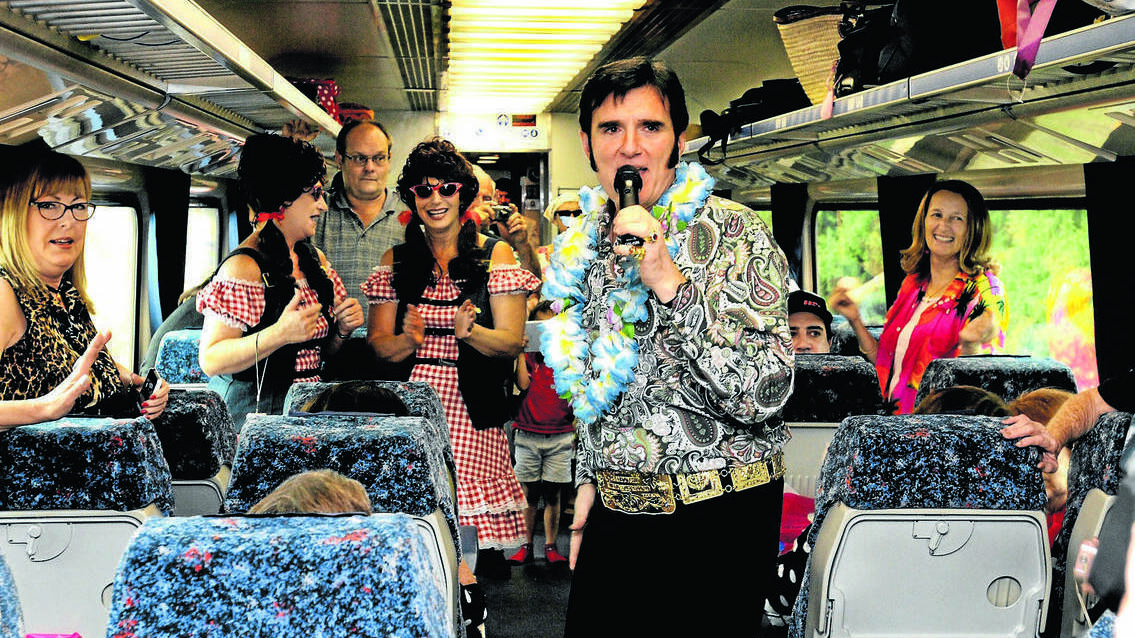 CENTRAL WESTERN DAILY (Orange) - Tribute artist Carmine Cimilio performs on the Elvis Express during a stopover in Orange. Photo: STEVE GOSCH 