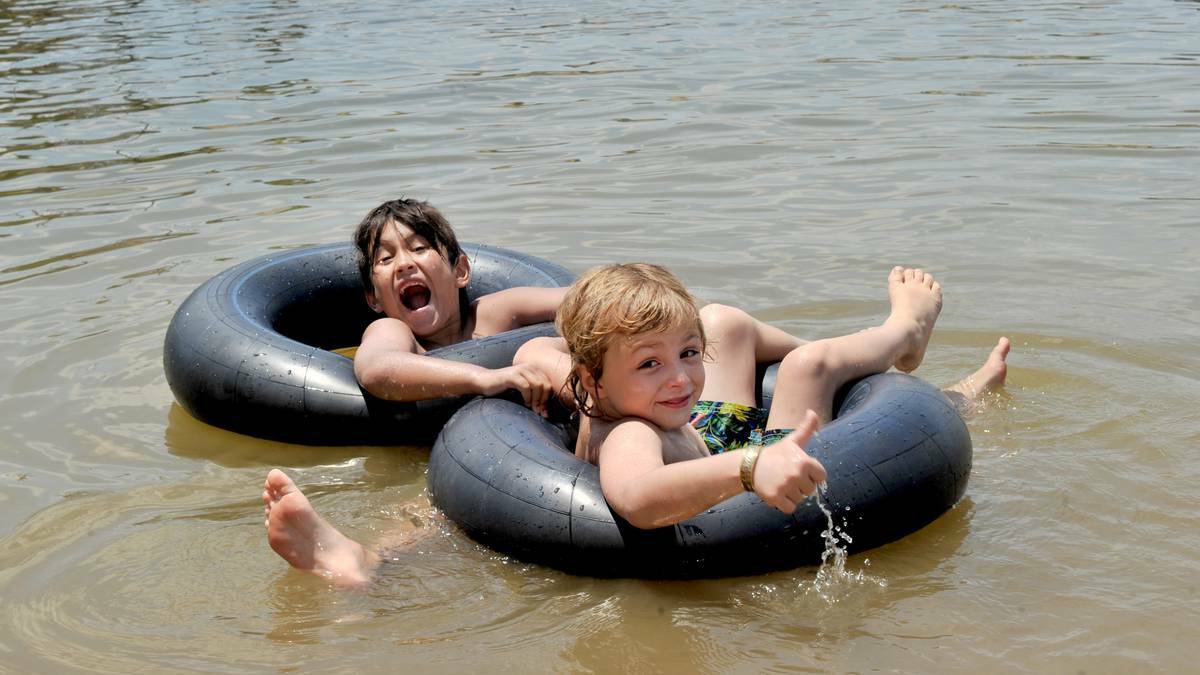 BENDIGO ADVERTISER - Cooling off at Crusoe Reservoir were Jaxson Froelich, 7 and Silver Carson, 8. Picture: JODIE DONNELLAN