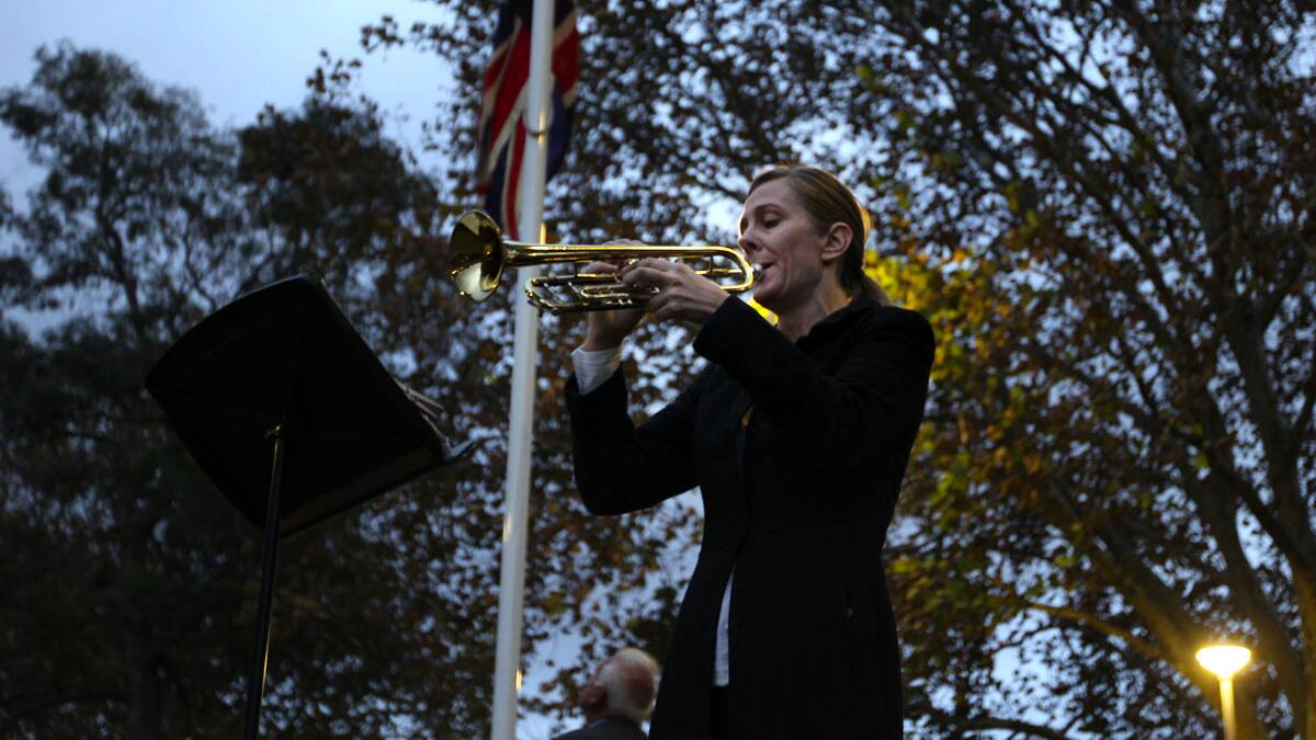 Alison Hunter sounds the Last Post during the Anzac day dawn service at Arncliffe park.Picture John Veage