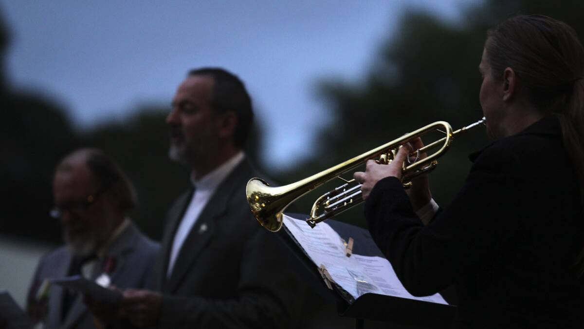 Alison Hunter sounds the Last Post during the Anzac day dawn service at Arncliffe park. Picture John Veage