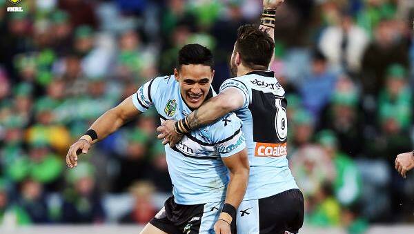 Match-winner: Cronulla winger Valentine Holmes (left) celebrates with Jack Bird after the Sharks exciting 21-20 golden point extra time win over Canberra. Picture: NRL.com.