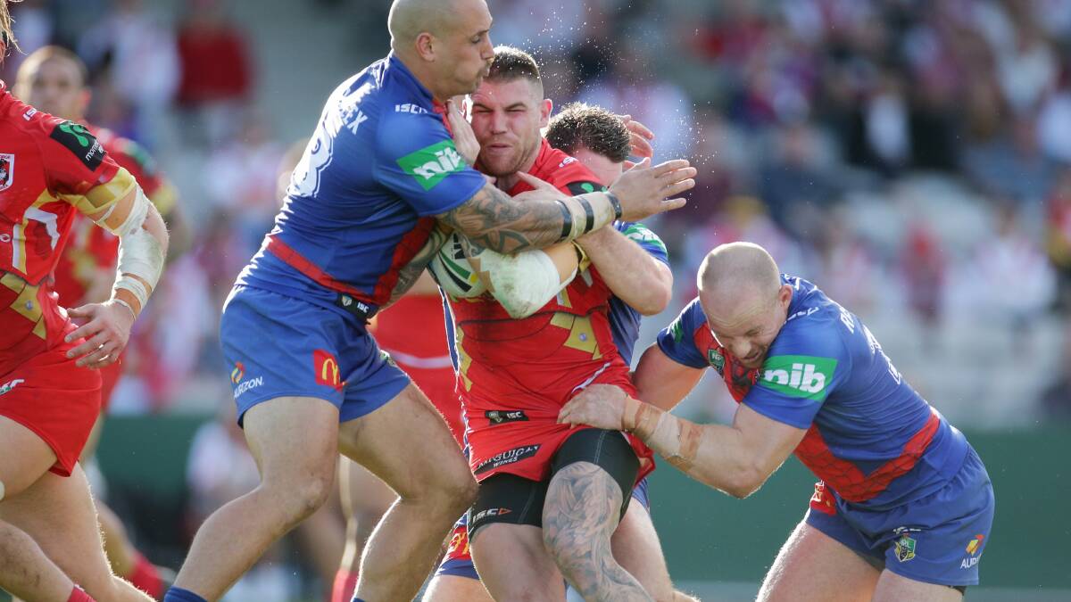 On the attack: Dragons fullback Josh Dugan in action against Newcastle. Picture: Chris Lane.