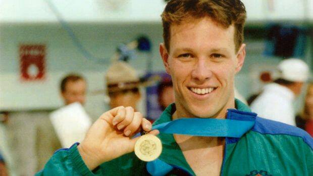 Kieren Perkins with his gold medal from the 1994 Commonwealth Games.  
