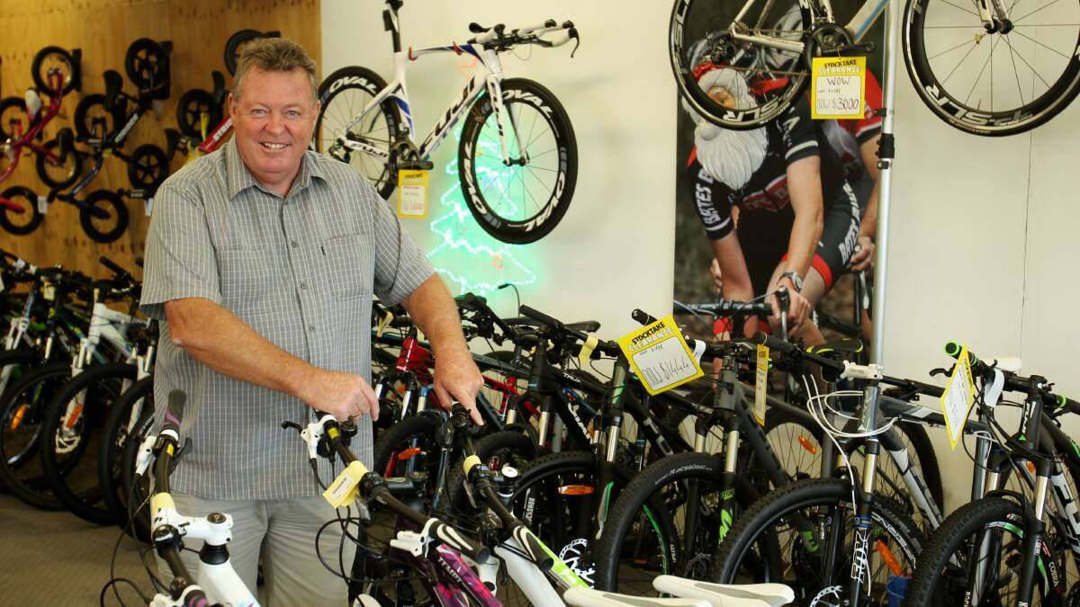 Leader reader: Sports entrepreneur Phill Bates at his bike shop, Bates Bikes, in Carlton. Picture Chris Lane.