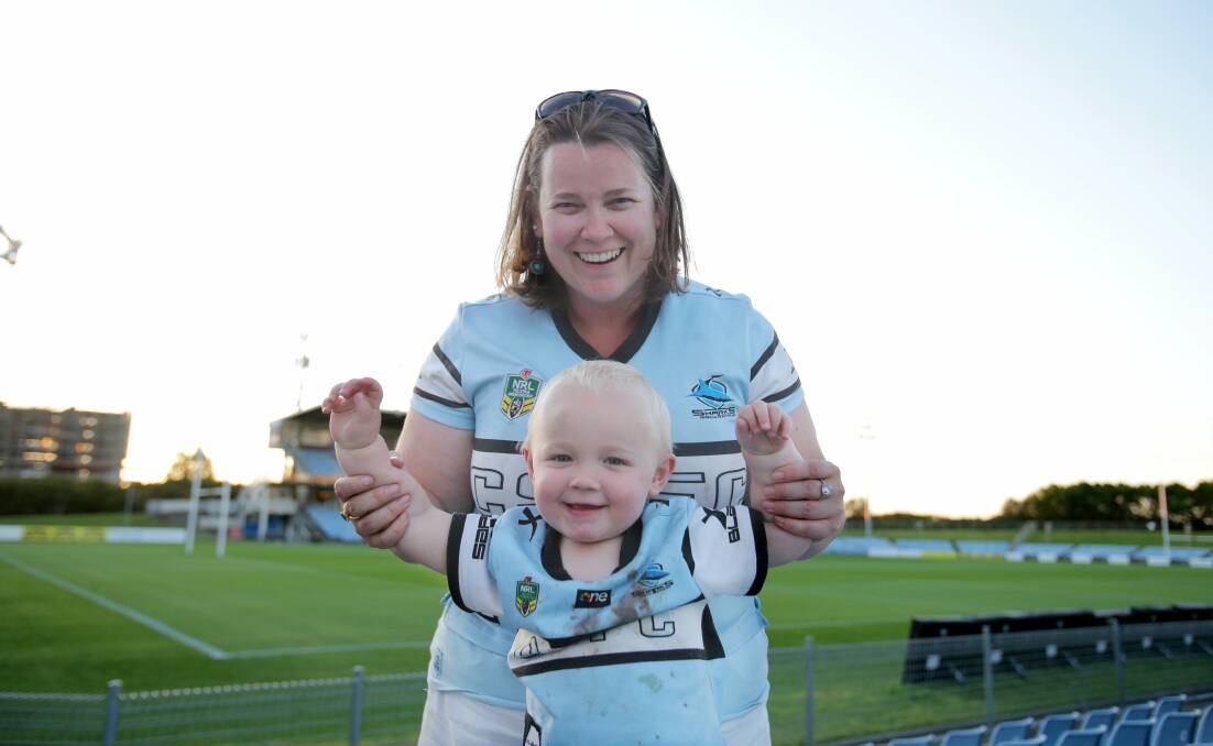 Going the distance: Cronulla fans Helen Baxter and her son Alex will be at the game in Townsville on Saturday night. Picture: Chris Lane
