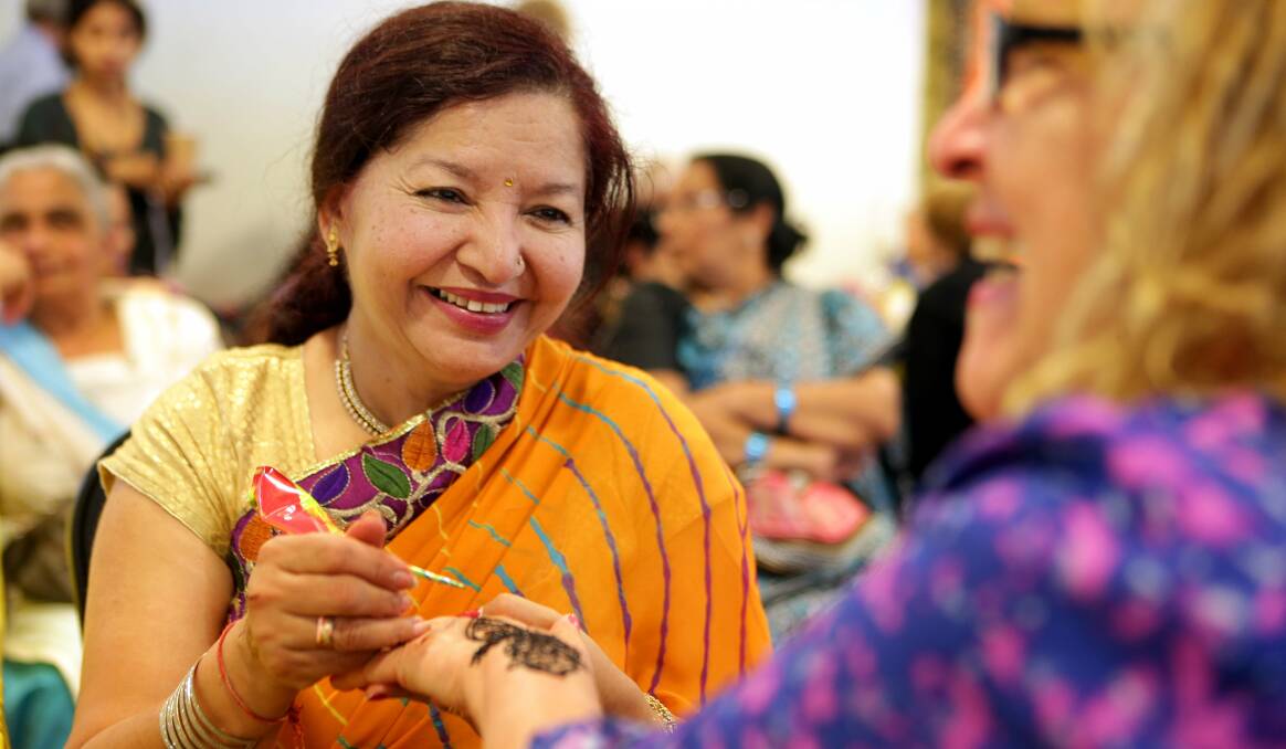 Diwali: Indian henna tattoos were a popular feature of the Diwali celebrations at Kingsgrove Community Aid Centre . Picture: Jane Dyson.

