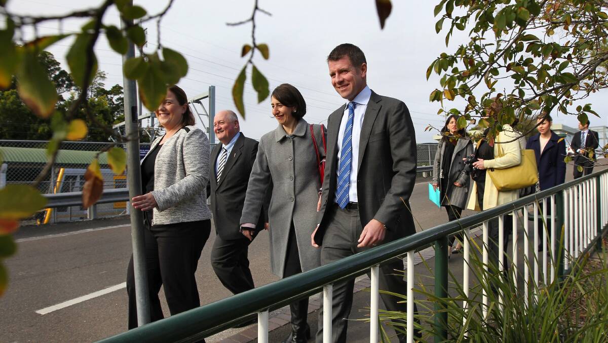 On right track: Mike Baird (far right), Gladys Berejiklian (second from right) and MPs Melanie Gibbons and Lee Evans at Sutherland railway station. Picture: John Veage
