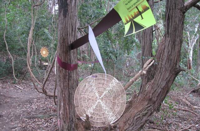 Protest art: People  hung nature poems and notes of protest about Westconnex and the destruction of the bushland at the Tree-Mendous Wolli on Sunday, July 20. Picture: Deb Little
