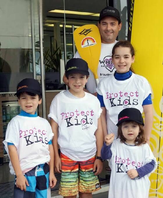 Ready for a cause: Sascha Chandler and youngsters will be in the Stand Up For Kids event this weekend at North Cronulla. Picture: supplied
