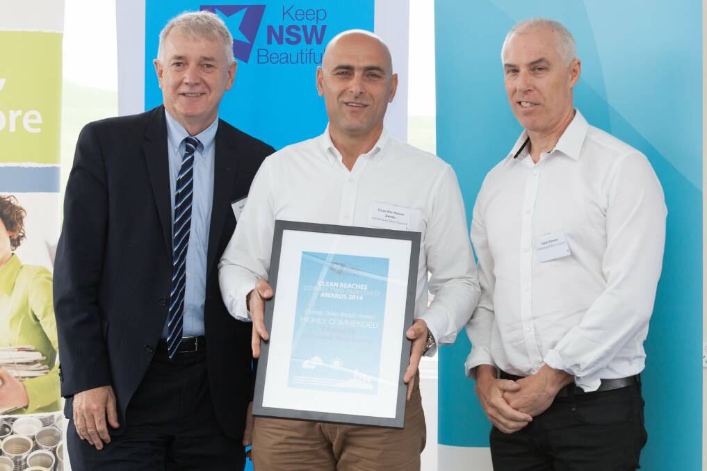Well done: Sydney Water’s Kevin Young (left) presents the award to Sutherland Shire councillor Hassan Awada and parks and recreation manager Gwyn Cleeves.
