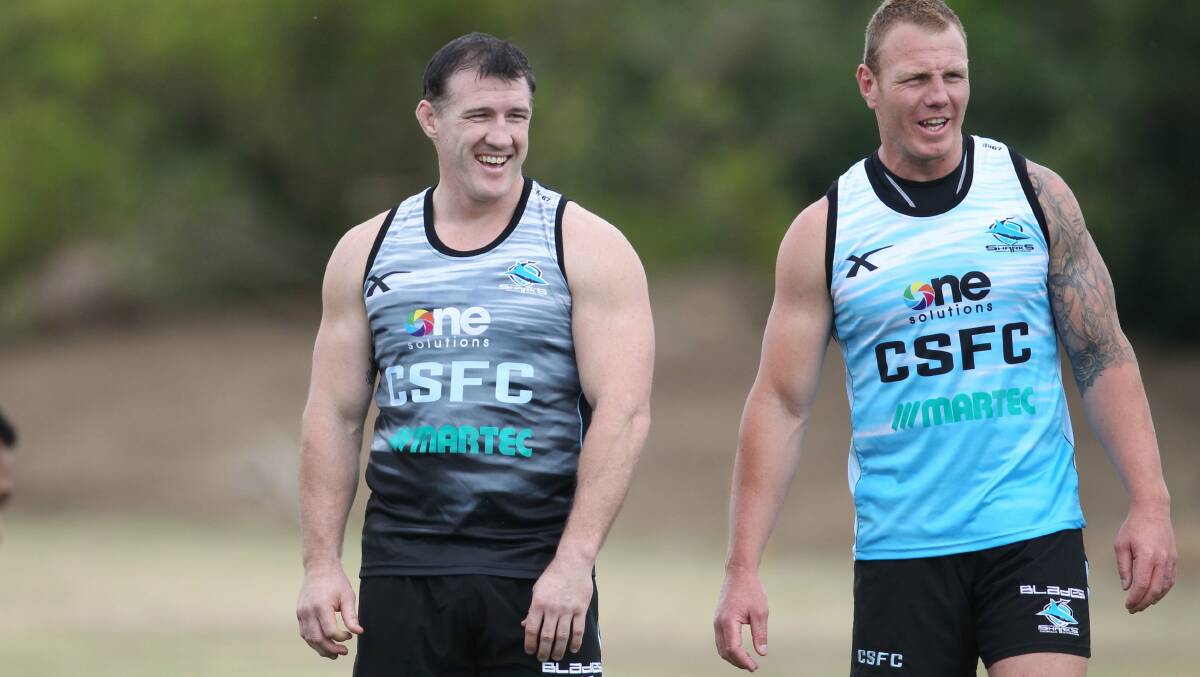Charged: Sharks backrower Luke Lewis (R) pictured with Paul Gallen at training has been charged by the match review committee. Picture: Chris Lane.
