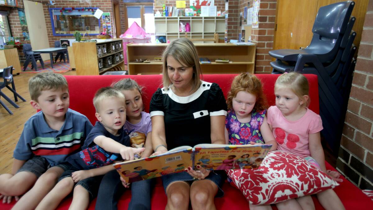
Change:  St Mark’s Preschool director Helen Meimaroglou said centres felt the effects of changes to preschool funding. She is with (from left) Jake, Connor, Nicoletta, Emily and Isabella. Picture: Jane Dyson
