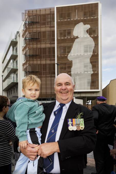 Vietnam Veteran Bruce Heyhoe, 7th Battalion and his grandson, also Bruce Heyhoe, 2, attend the artwork unveiling.  Picture: Supplied