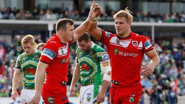 Brett Morris celebrates his try with Dragons teammate Jack de Belin. Photo: Getty Images.
