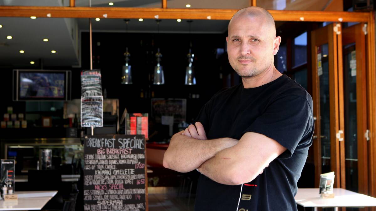 Breath of fresh air:
Kaimaki Cafe Kogarah owner Nick Georgopoulos said cigarette smoke was ‘‘affecting everybody’’. Picture: Jane Dyson

