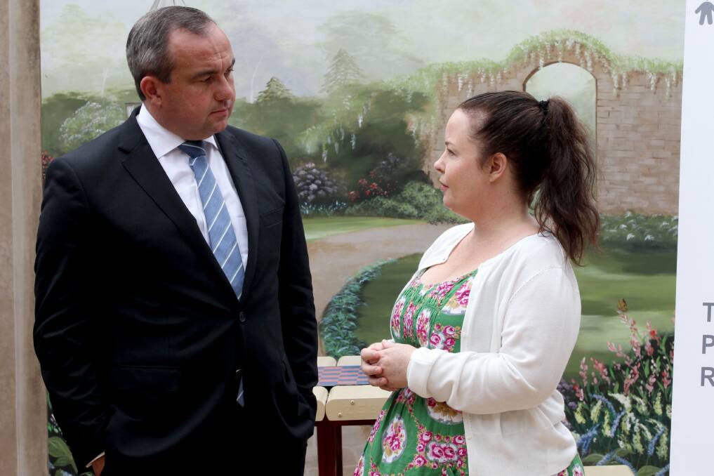 Life ‘‘saved’’: Karina Whitehurst and Minister for Mental Health Jai Rowell. Picture: Jane Dyson
