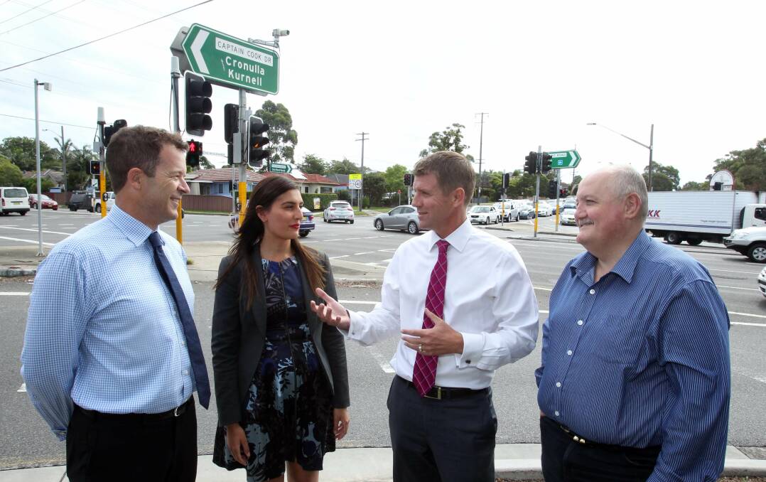 Pinch point projects...Cronulla MP Mark Speakman (left), Liberal candidate for Miranda Eleni Petinos, Mike Baird and Heathcote MP Lee Evans at Caringbah today. Picture: Chris Lane
