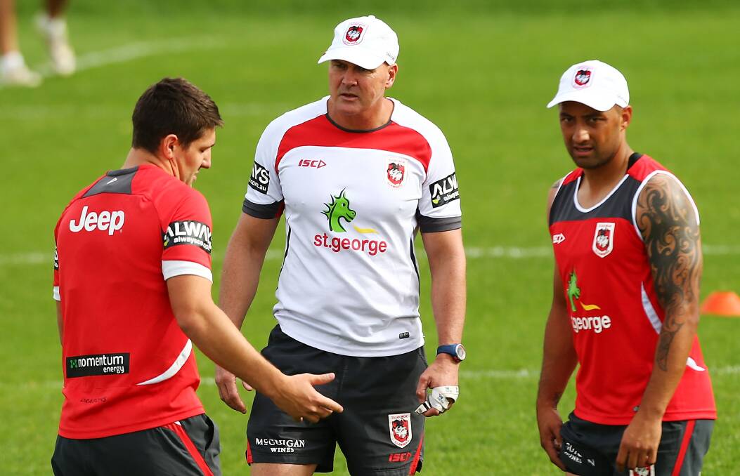 St George Illawarra halves Gareth Widdop (left) and Benji Marshall (right) at training with coach Paul McGregor. Picture: Getty Images. 
