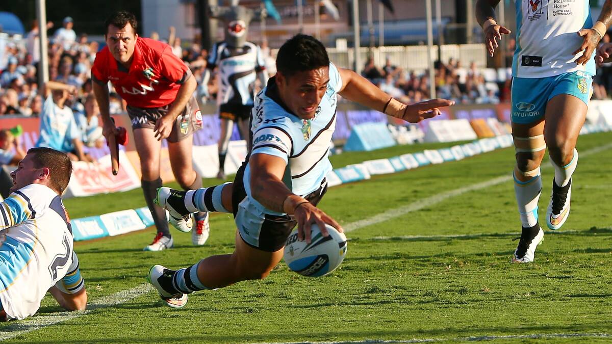 Valentine Holmes scores a try for the Sharks during the round four NRL match with Gold Coast Titans at Remondis Stadium in March. Picture: Renee McKay/Getty Images.

