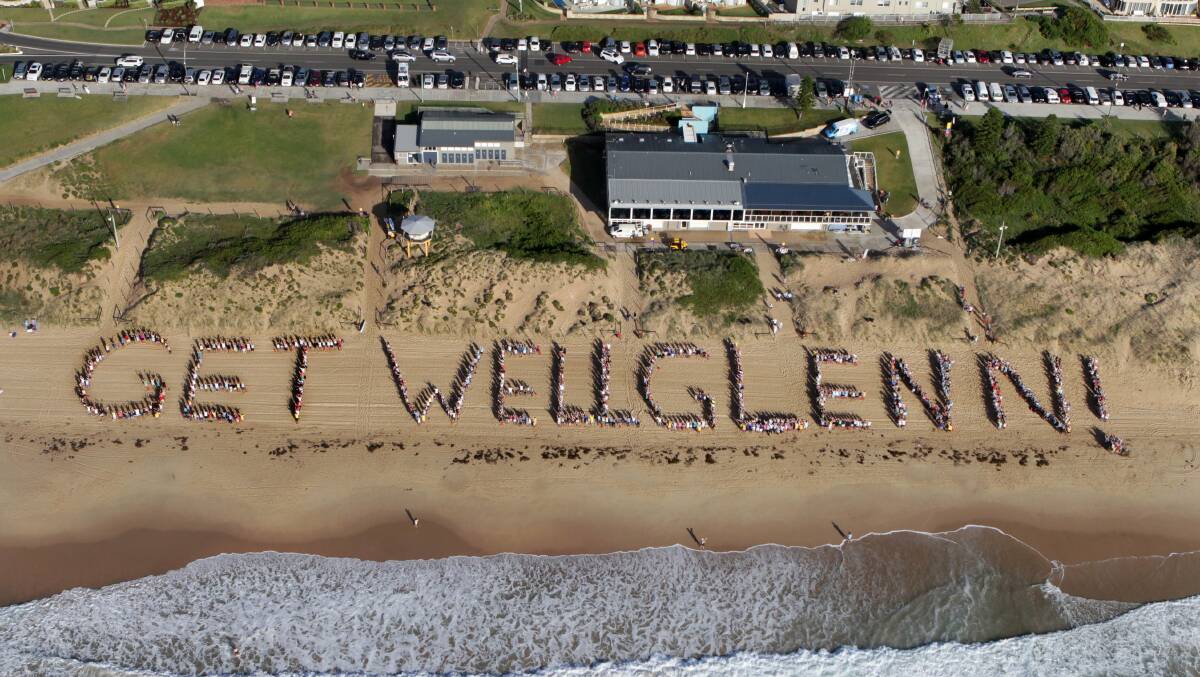 All the best: The southern Sydney community rallied to support injured Glenn Wheeler by forming his name on the sand at Elouera in February 2015. Picture: John Veage
