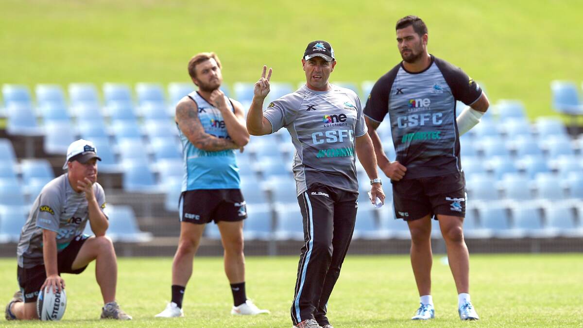 Can they do it? Sharks coach Shane Flanagan instructs players during a Cronulla Sharks NRL training session at Remondis Stadium in March. Picture: Renee McKay/Getty Images.
