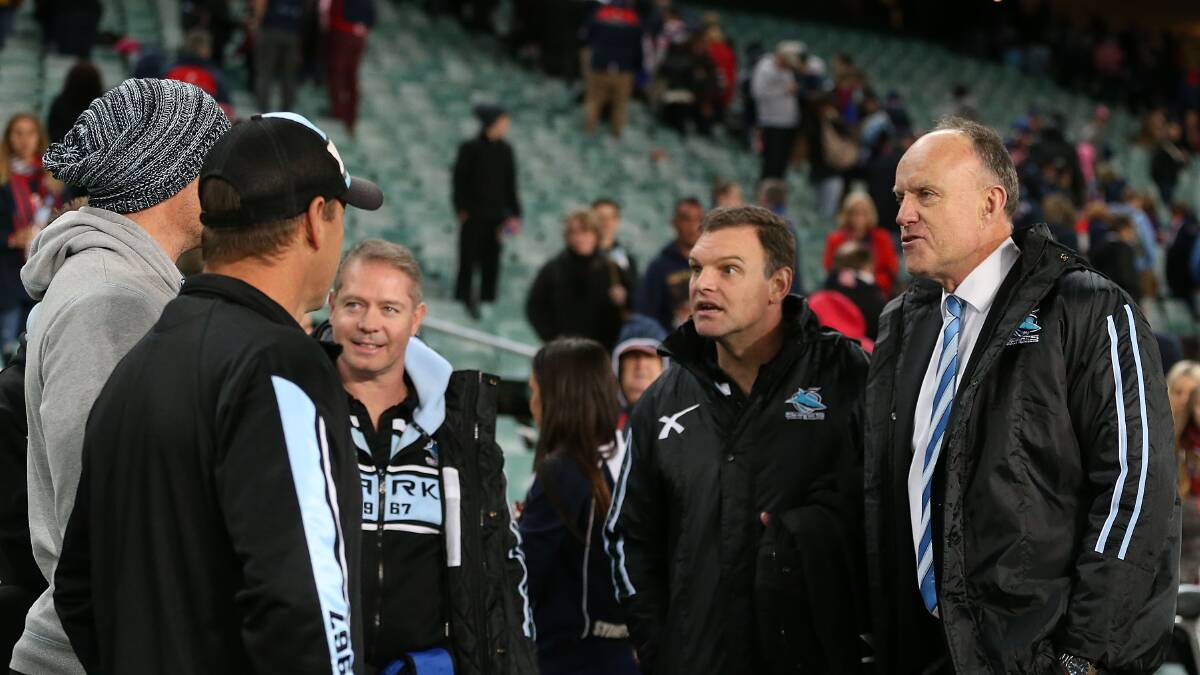 Rumour mill: Sharks Chief Executive Steve Noyce (far right) talks to Sharks staff after the Sharks/Roosters game on July 5 at Allianz Stadium. Picture: Mark Metcalfe/Getty
