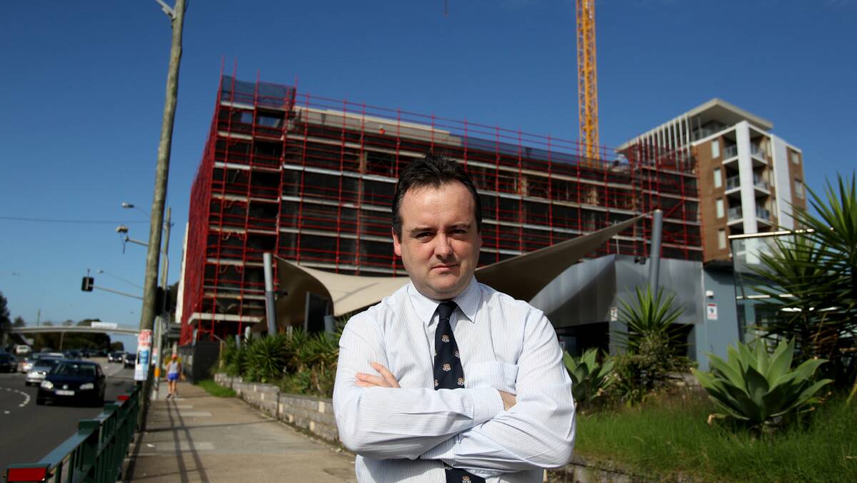 Non-complying: 
Councillor Lachlan McLean 
questions why the council granted three extra storeys. 
Picture: Chris Lane 
