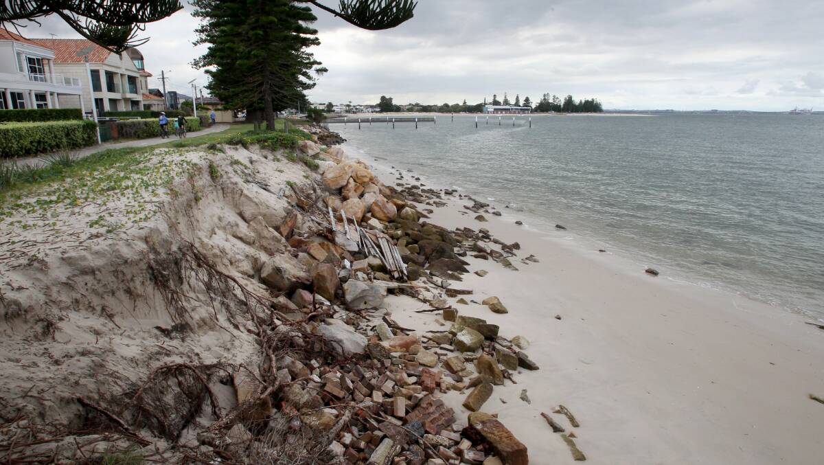Endangered: Luxury homes at the eroded foreshore.Picture: Jane Dyson

