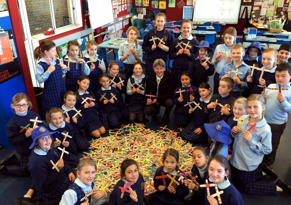 St Patrick’s Primary school at Sutherland have made 2277 Crosses in Remembrance, one for each Australian casualty at the Battle of Lone Pine, at Gallipoli which took place 100 years ago today. Picture: Supplied

