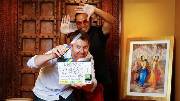 Director Anupam Sharma and Brett Lee who stars in Unindian at Govindas Restaurant in Sydney. Photo: Janie Barrett

