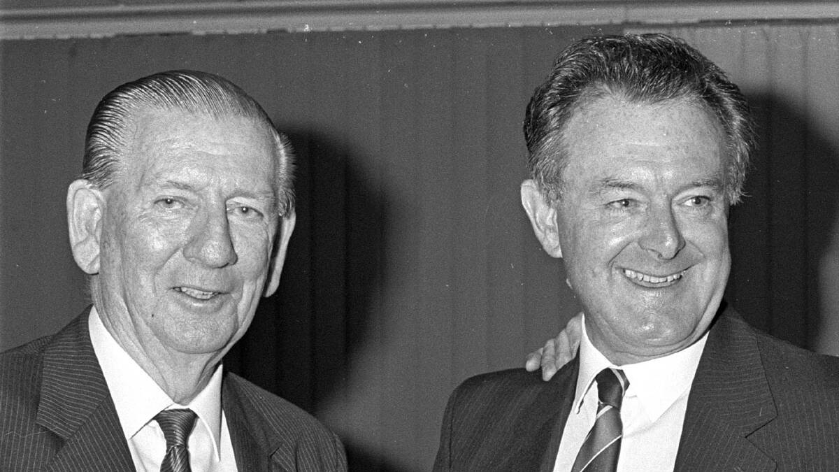 Leader founding editor Tom Mead (left) with manager Ron Stewart at a reunion in the 1980s. Picture: John Veage
